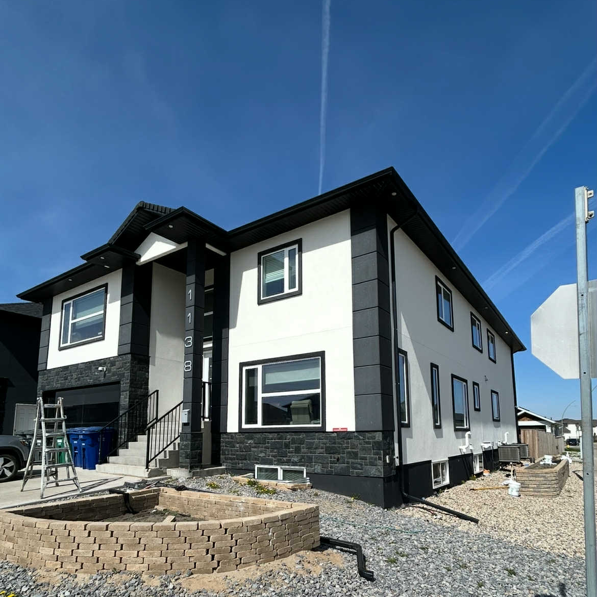 Exterior White Painted Stucco House